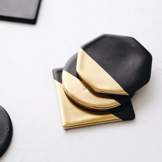 Elegant Ceramic Mug Coaster Set in Black and Gold - Available in Three Shapes - About Brew
